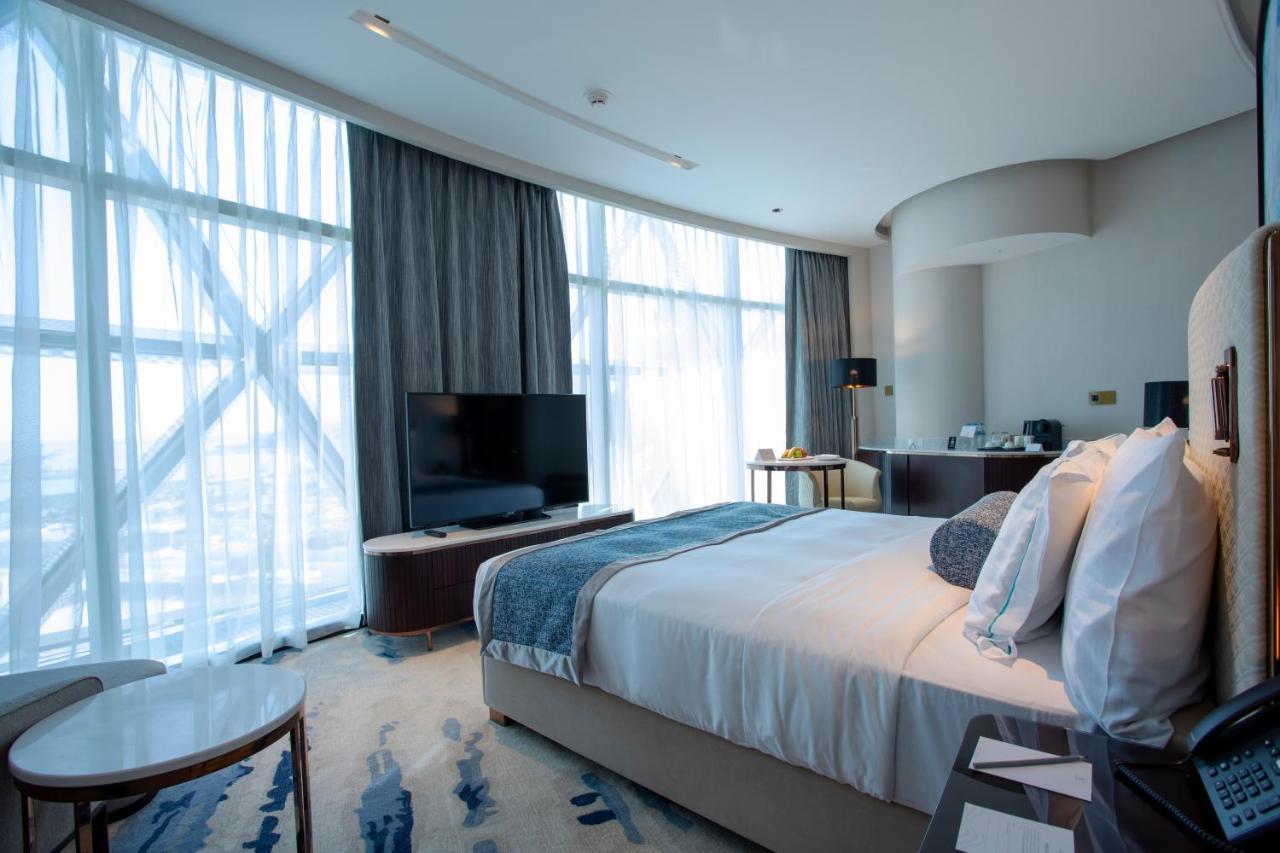 Century Marina Hotel - Lusail Екстер'єр фото A bedroom at the hotel