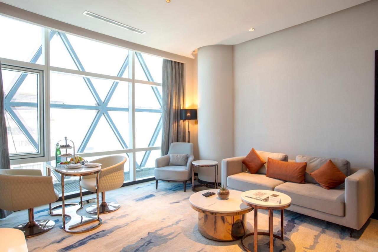 Century Marina Hotel - Lusail Екстер'єр фото A living room at the hotel