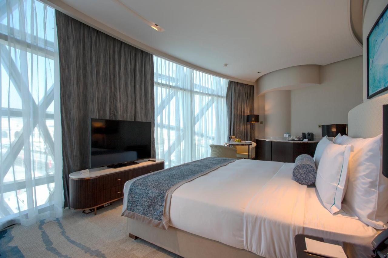 Century Marina Hotel - Lusail Екстер'єр фото A bedroom at the hotel