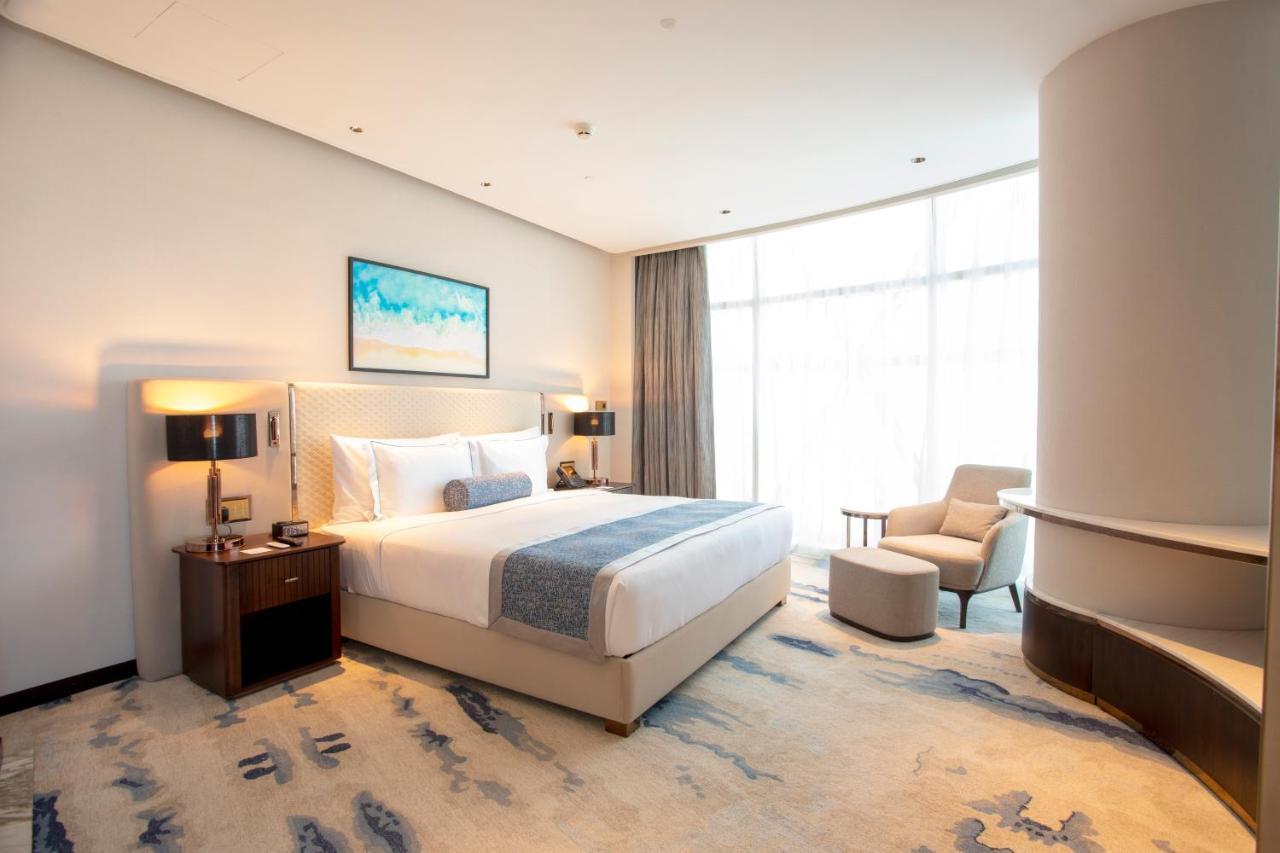 Century Marina Hotel - Lusail Екстер'єр фото A bedroom at the hotel