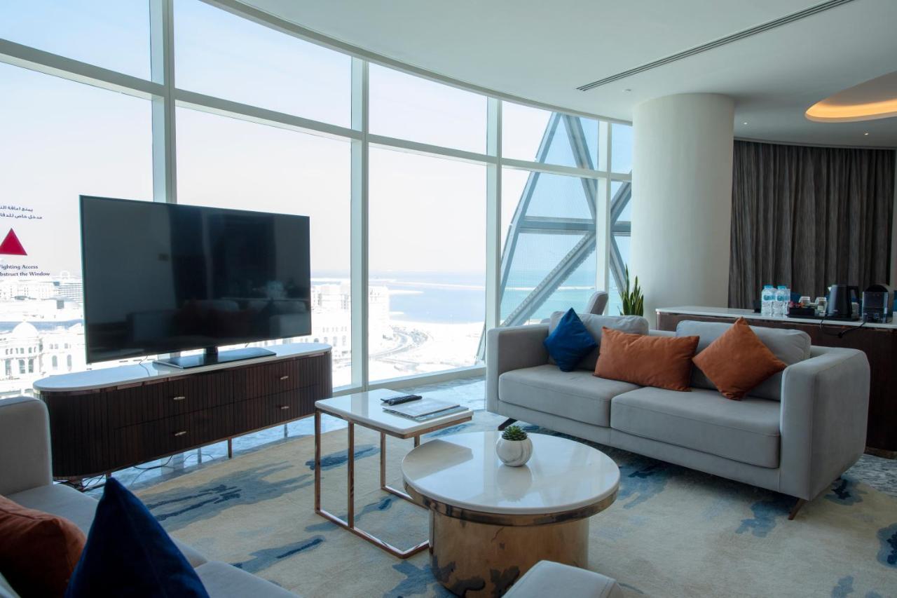 Century Marina Hotel - Lusail Екстер'єр фото A living room in a suite at the hotel