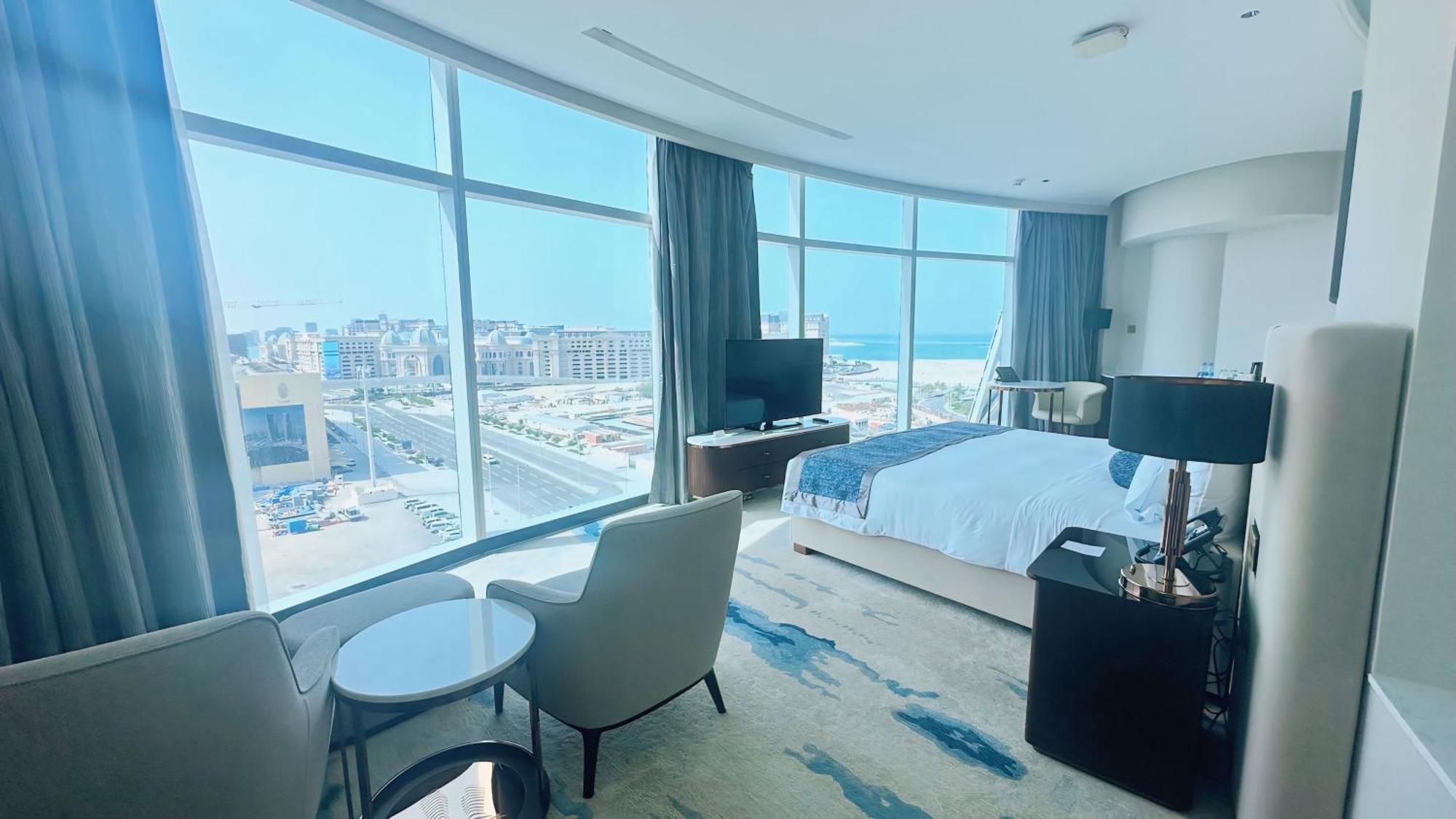 Century Marina Hotel - Lusail Екстер'єр фото A bedroom at the hotel